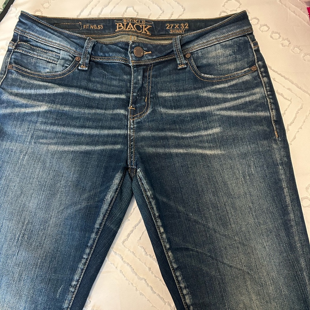 Buckle Black Jeans.